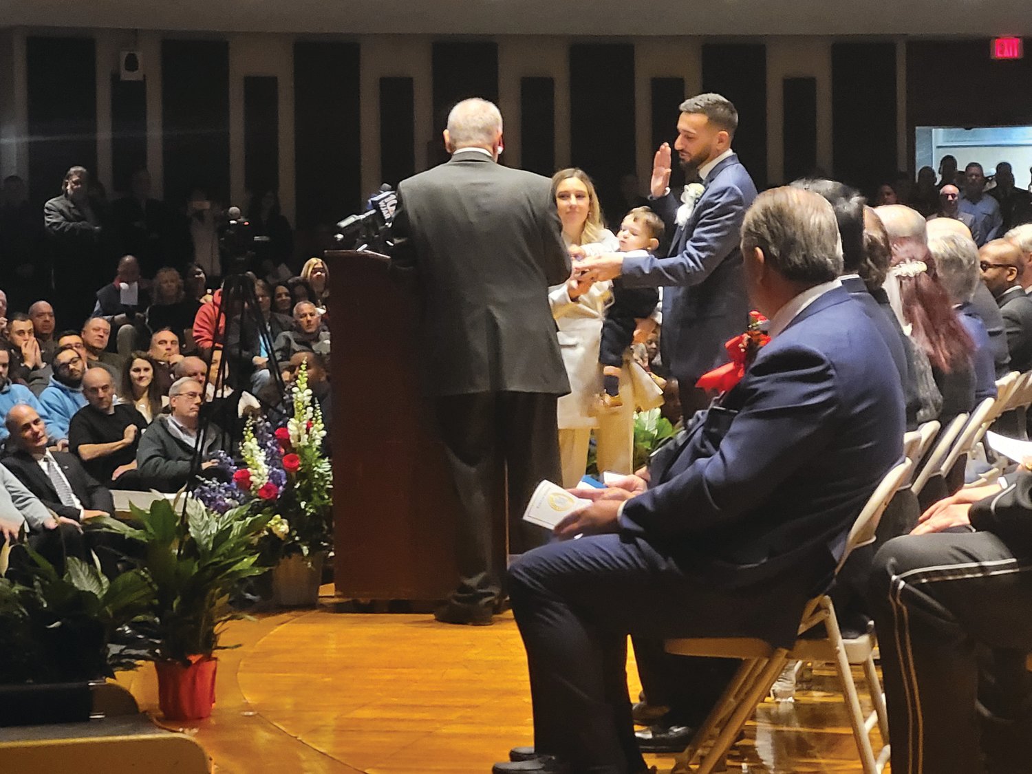 NEW MAYOR: Joseph Polisena Jr. took the oath of office on the evening of Monday, Jan. 9, becoming Johnston’s new mayor. His father, the now former mayor, swore-in the mayor-elect.